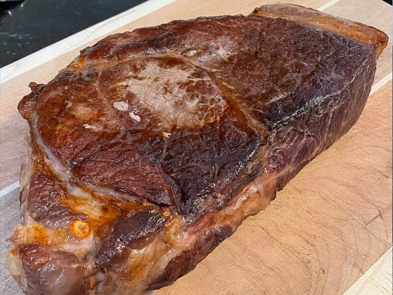 Oven Baked Chuck Roast resting on a cutting board